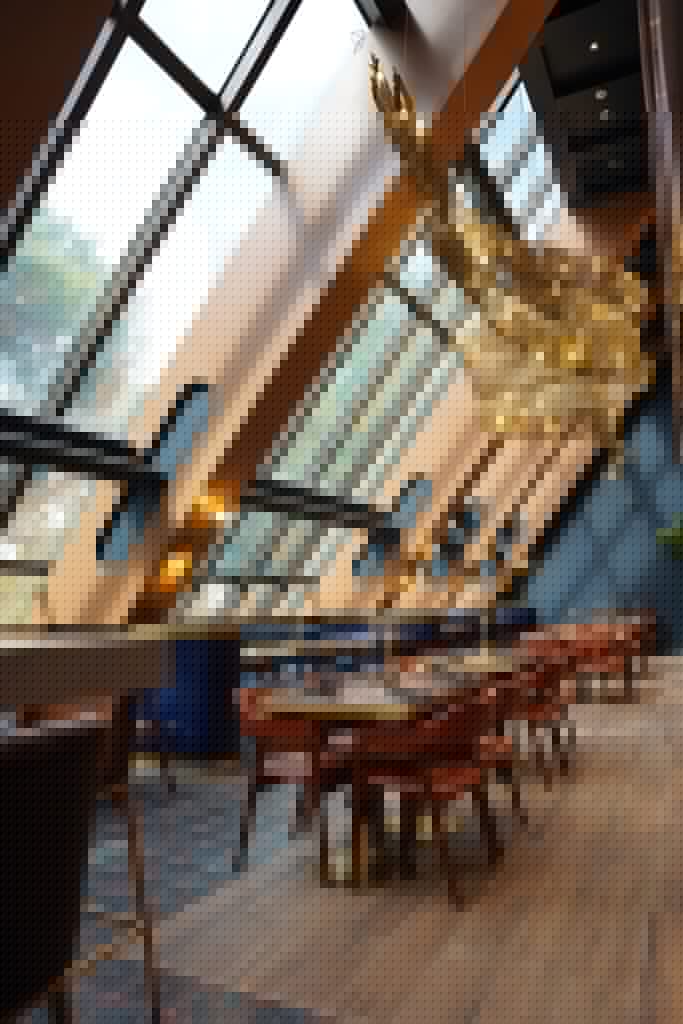 Oak and Smoke restaurant exterior at Pacquiao Mansion showing the dramatic glass ceiling and smoke installation